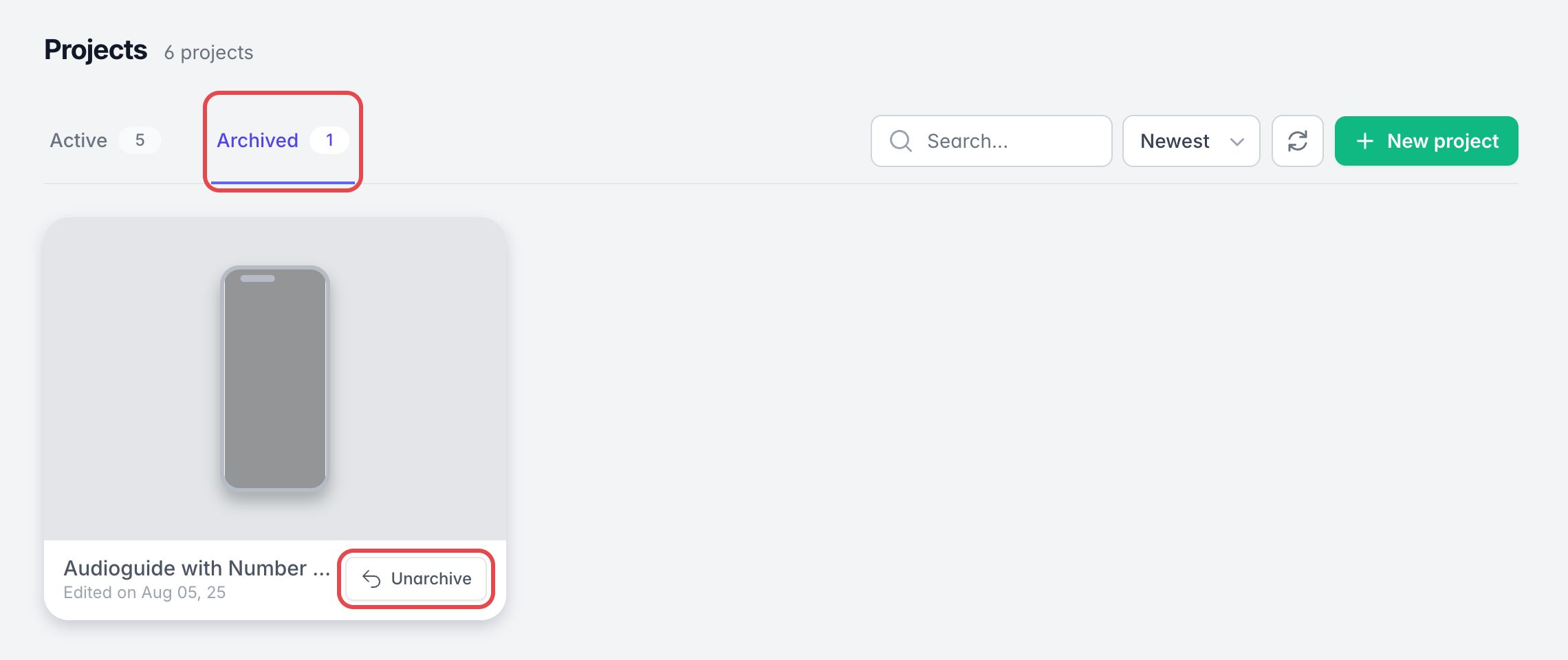 Onglet Archived de la liste des projets, encadré, avec un projet grisé et son bouton Unarchive encadré